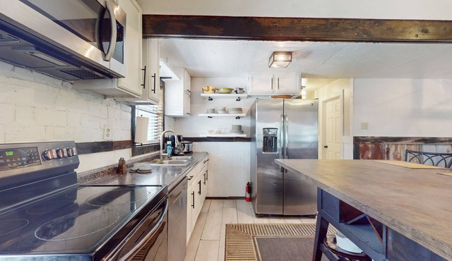Spacious house with firepit, wraparound porch, pavilion + dog friendly