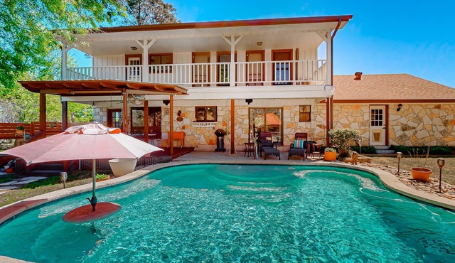 Spacious, quiet suburban home on two acres with backyard pool, balcony, & pond