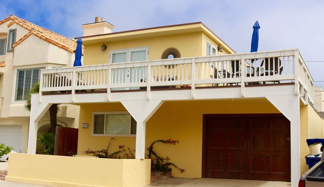 Steps from the beach See and hear the ocean from this beautiful beach house