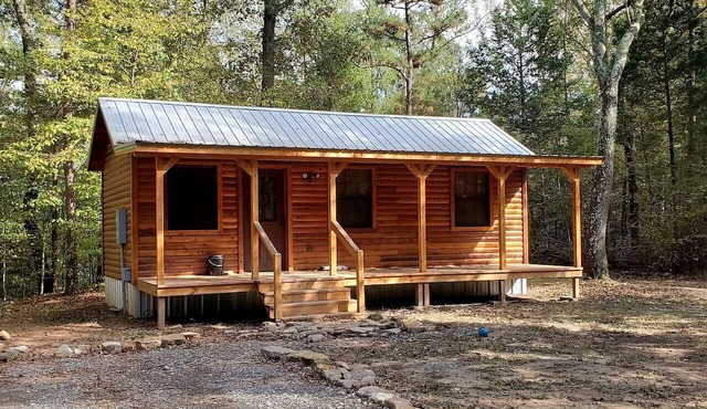 Stunning Riverfront Log Cabin Nestled Amidst Trees in Nashoba, Oklahoma