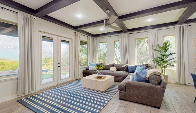 Stunning waterfront home with private pool, gym, & grill - steps to sand & SPI