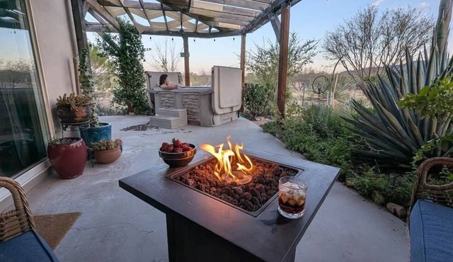 Watch the sunset from a private hot tub!