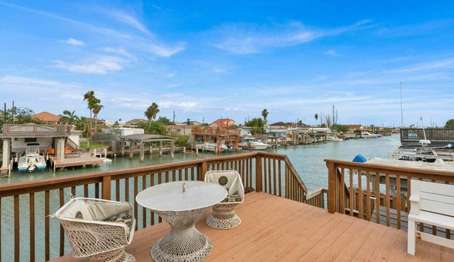 Waterfront, boat slips, expansive decks!