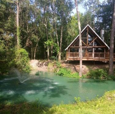 Waterfront Cabin Retreat with Private Dock and Pool in Plantersville Texas