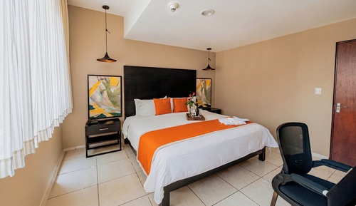 Family Suite, 2 Bedrooms, Kitchenette, City View (1 King Bed & 2 Twin Beds)