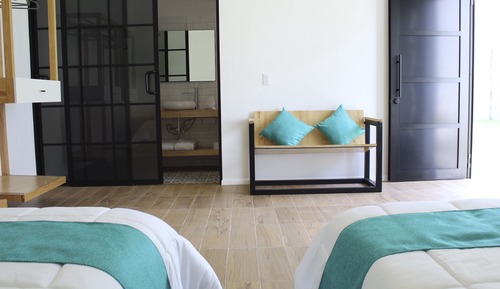 Design Quadruple Room, 2 Queen Beds, Garden View