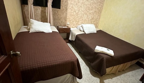 Basic Triple Room, Non Smoking, Shared Bathroom