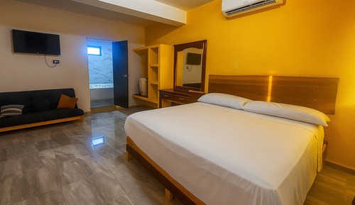 Deluxe Suite, Balcony, Garden View