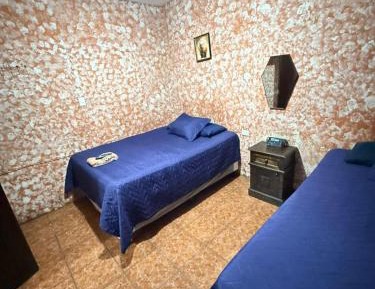 Economy Triple Room with Shared Bathroom