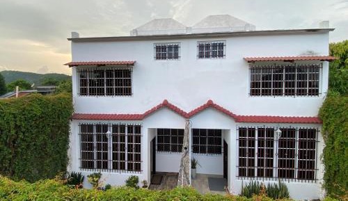 Eight-Bedroom House