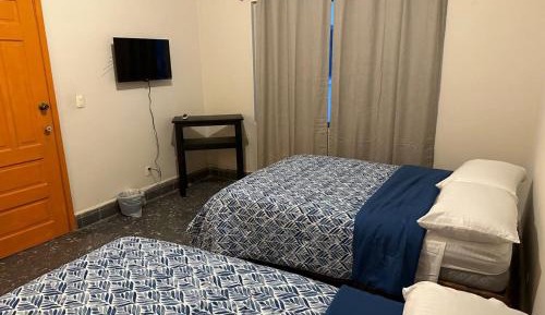 Quadruple Room with Shared Bathroom