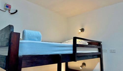 Single Bed in Dormitory Room
