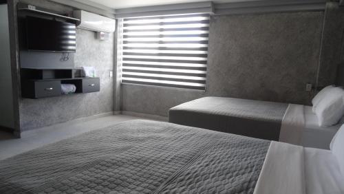 Deluxe Queen Room with Two Queen Beds