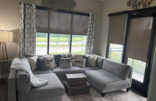 Las Colinas Apartment | Escape to this modern,western-style home located steps away from the scenic lake
