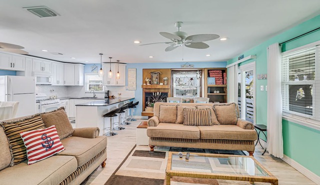 Inviting waterfront home with balcony, full kitchen, W/D, & dog-friendly